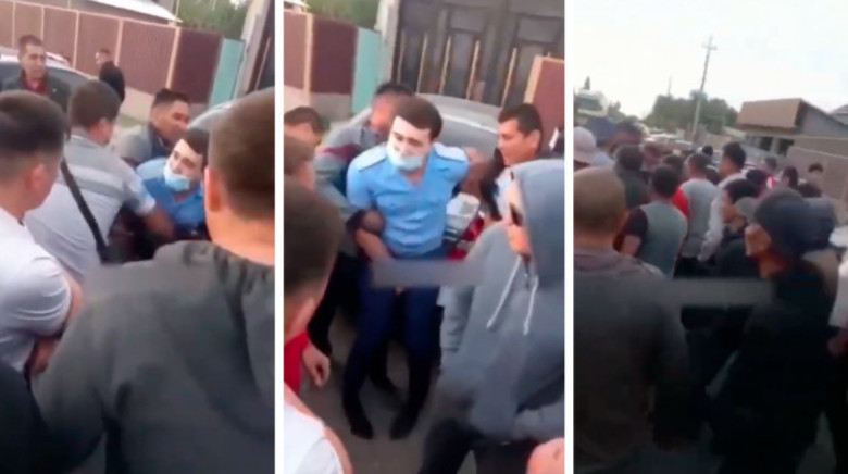 В Туркестанской области родственники погибшего мужчины пытались снять с полицейского штаны