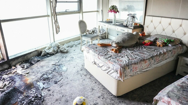 Пожар в Астане: акимат пообещал восстановить фасад и пострадавшие квартиры