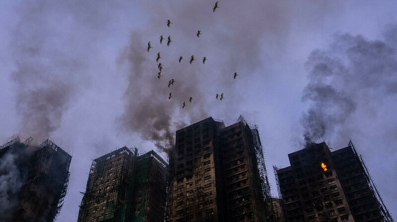 Число погибших при пожаре в Гонконге достигло 75 человек